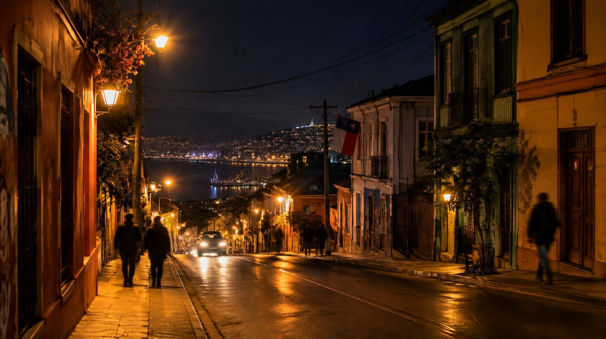 Night view of an illuminated street in a Chilean neighborhood